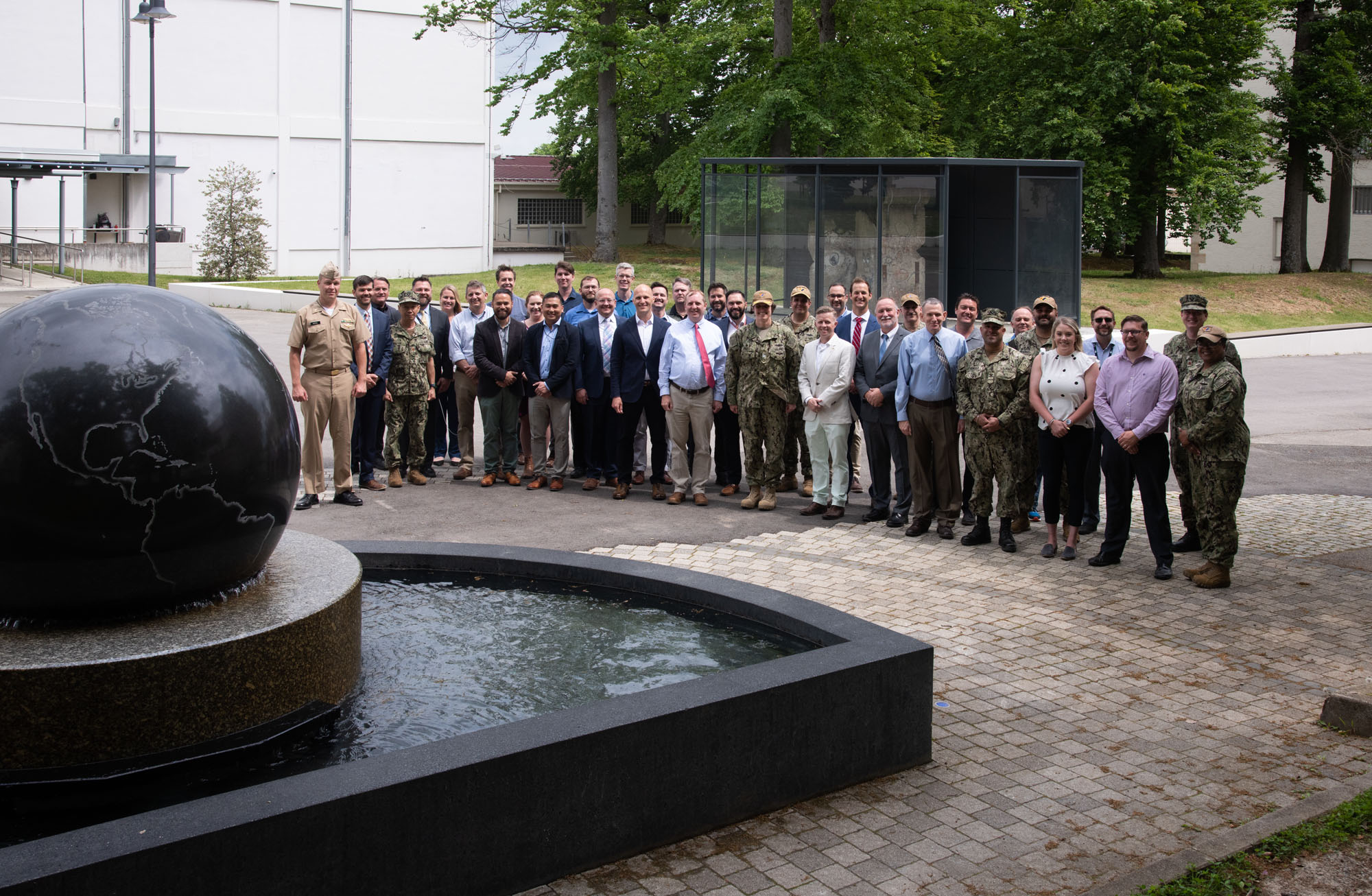 Group photo of a NIWC Atlantic Team near a fountain